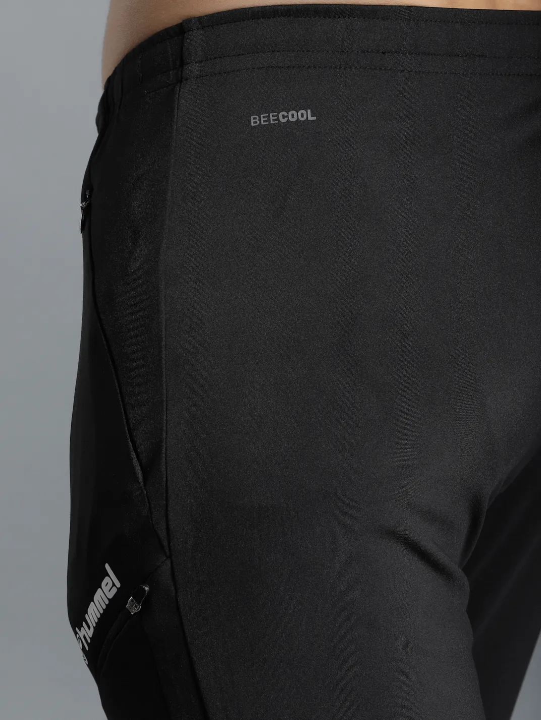 Football Solid Regular fit Polyester Trackpants for Men with zipper pockets Comfortable Breathable Fabric Stretchable for Everyday Use Ideal for Yoga Training Gym Running or Performance