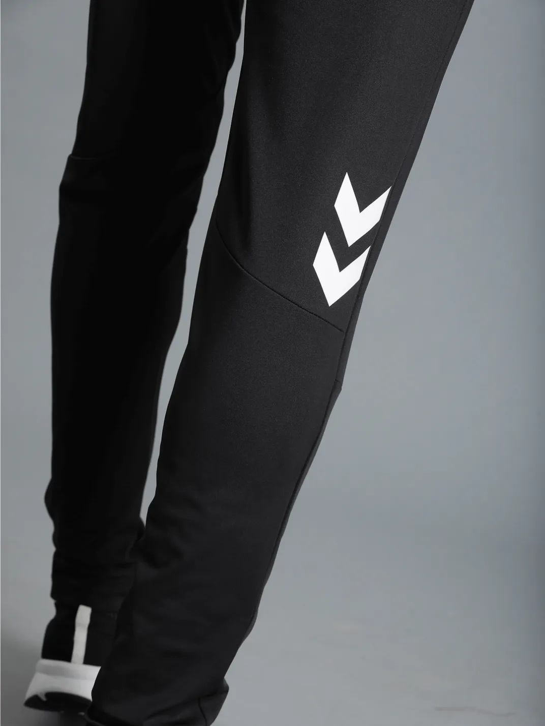 Football Solid Regular fit Polyester Trackpants for Men with zipper pockets Comfortable Breathable Fabric Stretchable for Everyday Use Ideal for Yoga Training Gym Running or Performance