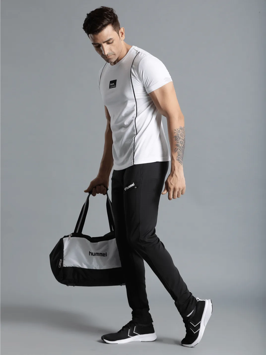Football Solid Regular fit Polyester Trackpants for Men with zipper pockets Comfortable Breathable Fabric Stretchable for Everyday Use Ideal for Yoga Training Gym Running or Performance