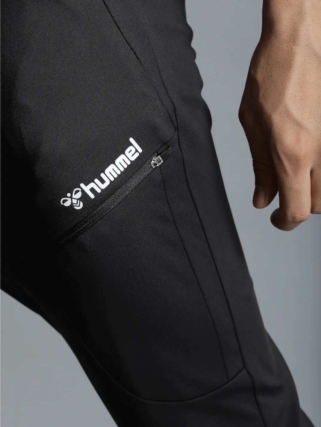 Football Solid Regular fit Polyester Trackpants for Men with zipper pockets Comfortable Breathable Fabric Stretchable for Everyday Use Ideal for Yoga Training Gym Running or Performance